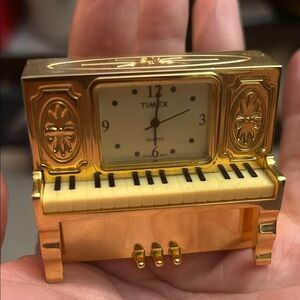 Timex Gold Piano Clock with White Face
